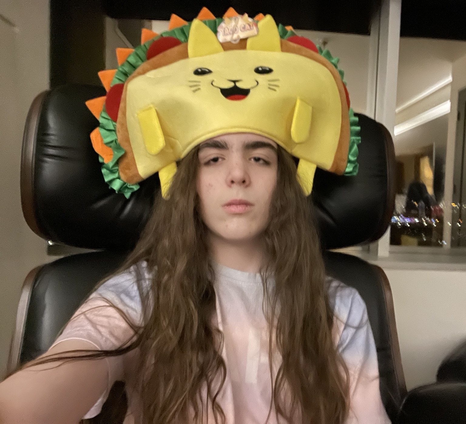 Charlie R. Williams wearing a playful taco character hat